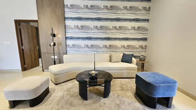 Living room in a completed 3BHK interior project by The Haus Projekt in Bangalore
